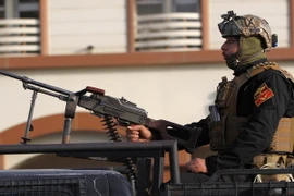 Lực lượng an ninh đặc nhiệm Iraq tuần tra ở thành phố miền bắc Kirkuk trong thời điểm người Kurd tiến hành bỏ phiếu trưng cầu dân ý. (Nguồn: AFP/TTXVN)