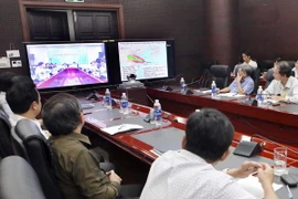 Quang cảnh Hội nghị trực tuyến ứng phó với bão số 10 tại điểm cầu Đà Nẵng. (Ảnh: Trần Lê Lâm/TTXVN)