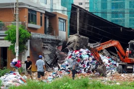 Hiện trường vụ cháy. (Ảnh: Mạnh Linh/TTXVN)