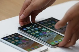 3 mẫu điện thoại thông minh iPhone 8, iPhone 8 Plus và iPhone X. (Nguồn: AFP/TTXVN)