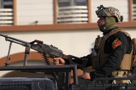 Lực lượng an ninh đặc nhiệm Iraq tuần tra ở thành phố miền bắc Kirkuk trong thời điểm người Kurd tiến hành bỏ phiếu trưng cầu dân ý. (Nguồn: AFP/TTXVN)