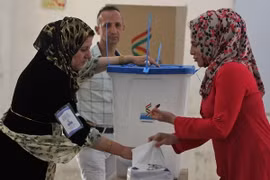 Người Kurd bỏ phiếu trưng cầu ý dân ở thành phố Kirkuk, miền bắc Iraq ngày 25/9. (Nguồn: AFP/TTXVN)