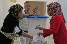 Người Kurd bỏ phiếu trưng cầu ý dân ở thành phố Kirkuk, miền bắc Iraq ngày 25/9. (Nguồn: AFP/TTXVN)