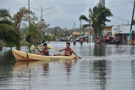 Ngập lụt do bão Maria tại Juana Matos thuộc Catano, Puerto Rico ngày 21/9. (Nguồn: AFP/TTXVN)