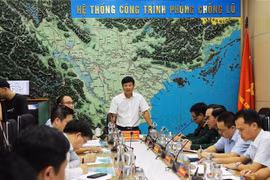 Quang cảnh buổi họp của Ban Chỉ đạo Quốc gia về Phòng, Chống Thiên tai triển khai ứng phó với bão số 5. (Ảnh: Vũ Sinh/TTXVN)
