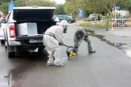 Tình huống diễn tập ứng phó với sự cố bức xạ và hạt nhân. (Ảnh: Trần Tĩnh/TTXVN)