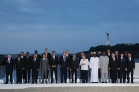 Các nhà lãnh đạo G7 và khách mời chụp ảnh chung tại Hội nghị thượng đỉnh G7 ở Biarritz, ngày 25/8/2019. (Ảnh: AFP/TTXVN)