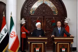 Tổng thống Iran Hassan Rouhani (trái) và Tổng thống Iraq Barham Salih. (Nguồn: Reuters)