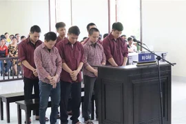 Các bị cáo tại phiên tòa. (Ảnh: Đậu Tất Thành/TTXVN)