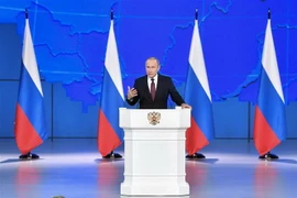 Tổng thống Vladimir Putin đọc Thông điệp liên bang thường niên trước Hội đồng Liên bang Nga ở Moskva ngày 20/2. (Ảnh: AFP/TTXVN)