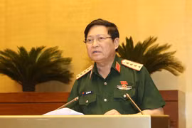 Đại tướng Ngô Xuân Lịch, Bộ trưởng Bộ Quốc phòng giải trình ý kiến của đại biểu Quốc hội. (Ảnh: Doãn Tấn/TTXVN)
