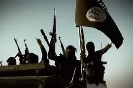 Các tay súng IS tại một địa điểm ở tỉnh Anbar, Iraq, ngày 17/3/2014. (Ảnh: AFP/TTXVN)