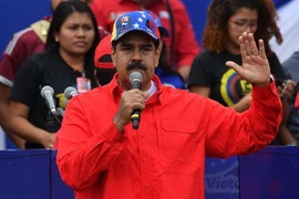 Tổng thống Venezuela Nicolas Maduro phát biểu trước những người ủng hộ nhân dịp kỉ niệm 20 năm cuộc cách mạng Bolivar do cố Tổng thống Hugo Chavez khởi xướng ở Caracas ngày 2/2/2019. (Ảnh: AFP/TTXVN)