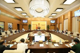 Phiên họp thứ 33 của Ủy ban Thường vụ Quốc hội thảo luận cho ý kiến về dự án Luật Xuất cảnh, nhập cảnh của công dân Việt Nam. (Ảnh: Dương Giang/TTXVN)