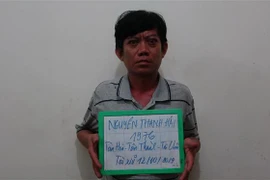 Đối tượng Nguyễn Thanh Hải tại cơ quan Công an huyện Hòa Thành. (Ảnh: Thanh Tân/TTXVN)