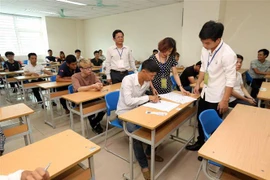 Một kỳ thi tiếng Hàn cho lao động Việt Nam đi làm việc tại Hàn Quốc. (Ảnh: Anh Tuấn/TTXVN)