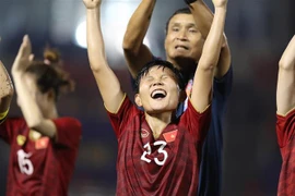 Niềm hân hoan của thầy trò HLV Mai Đức Chung. (Ảnh: Hoàng Linh/TTXVN)