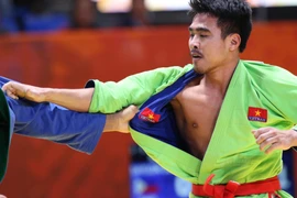 Bùi Minh Quân giành HCV SEA Games 30. (Ảnh: Vietnam+)