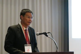 Phó Bí thư thường trực tỉnh kiêm Chủ tịch Hội đồng Nhân dân tỉnh Trần Văn Vinh phát biểu tại Hội thảo. (Ảnh: Mạnh Hùng/Vietnam+)