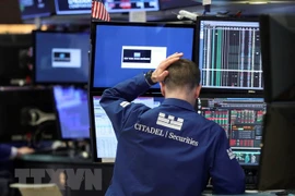 Giao dịch viên tại Sàn giao dịch chứng khoán New York, Mỹ. (Nguồn: THX/TTXVN)