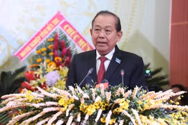 Ông Trương Hòa Bình phát biểu chỉ đạo Đại hội. (Ảnh: Huỳnh Phúc Hậu/TTXVN)