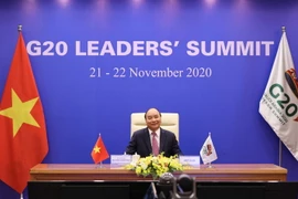 [Photo] Thủ tướng Nguyễn Xuân Phúc dự phiên thảo luận Hội nghị G20 