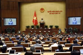 Thống đốc Ngân hàng Nhà nước Nguyễn Thị Hồng trình bày Tờ trình dự án Luật Phòng, chống rửa tiền (sửa đổi). (Ảnh: An Đăng/TTXVN)