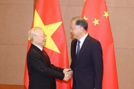 Tổng Bí thư Nguyễn Phú Trọng hội kiến Chủ tịch Chính hiệp Trung Quốc Uông Dương. (Ảnh: Trí Dũng/TTXVN)