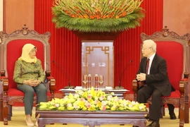 Tổng Bí thư Nguyễn Phú Trọng tiếp Tổng thống Cộng hòa Singapore Halimah Yacob. (Ảnh: Trí Dũng/TTXVN)