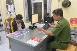 Đối tượng Từ Thanh Tùng bị bắt giữ. (Ảnh: TTXVN phát)