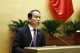 Chủ nhiệm Ủy ban Pháp luật của Quốc hội Hoàng Thanh Tùng trình bày Báo cáo thẩm tra dự thảo Nghị quyết ban hành Nội quy kỳ họp Quốc hội (sửa đổi). (Ảnh: An Đăng/TTXVN)