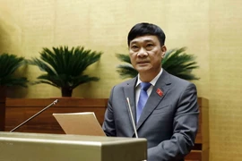 Chủ nhiệm Ủy ban Kinh tế của Quốc hội Vũ Hồng Thanh trình bày Báo cáo thẩm tra dự án Luật Hợp tác xã (sửa đổi). (Ảnh: An Đăng/TTXVN)
