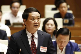 Bộ trưởng, Chủ nhiệm Ủy ban Dân tộc Hầu A Lềnh phát biểu giải trình, làm rõ một số vấn đề đại biểu Quốc hội nêu. (Ảnh: An Đăng/TTXVN)