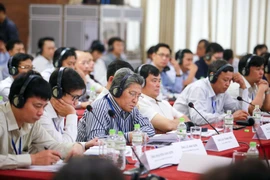 'Diễn đàn quy hoạch và phát triển đô thị Việt Nam hướng tới tăng trưởng xanh và ứng phó với biến đổi khí hậu' thu hút rất nhiều đại biểu trong nước và các tổ chức quốc tế. (Ảnh: PV/Vietnam+)