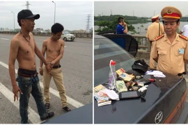 Những thanh niên nghi "ngáo đá" bị lực lượng chức năng khống chế khi có biểu hiện bất bình thường. (Ảnh: PV/Vietnam+)