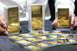 Vàng miếng được trưng bày tại một sàn giao dịch ở Seoul. (Ảnh: Yonhap/TTXVN)