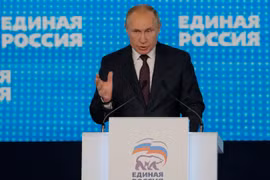 Tổng thống Nga Vladimir Putin phát biểu tại Đại hội lần thứ 19 của đảng Nước Nga thống nhất ở Moskva ngày 23/11. (Ảnh: AFP/TTXVN)