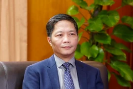 Bộ trưởng Bộ Công Thương Trần Tuấn Anh trả lời phỏng vấn các cơ quan Thông tấn báo chí trong nước và quốc tế trước thềm Hội nghị Bộ trưởng phụ trách Thương mại APEC lần thứ 23 (MRT 23). (Ảnh: Văn Điệp/TTXVN)