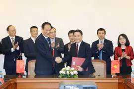 Lễ ký kết. (Ảnh: Doãn Tấn/TTXVN)