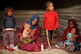 Người dân Syria tại một trại tị nạn ở Đông Ghouta. (Ảnh: AFP/TTXVN)