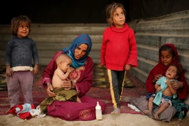Người dân Syria tại một trại tị nạn ở Đông Ghouta. (Ảnh: AFP/TTXVN)