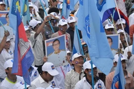 Người ủng hộ của CNRP tại một buổi tuần hành. (Ảnh: Phan Minh Hưng/TTXVN)