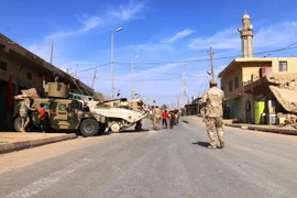 Binh sỹ Iraq trong chiến dịch truy quét IS tại khu vực thành phố Rawa, gần biên giới với Syria, ngày 18/11 vừa qua.(Ảnh: THX/TTXVN)