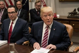 Tổng thống Mỹ Donald Trump - bên phải. (Ảnh: AFP/TTXVN)