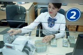Dự báo lượng kiều hối về Việt Nam năm nay sụt giảm do ảnh hưởng của dịch bệnh. (Ảnh: CTV/Vietnam+)