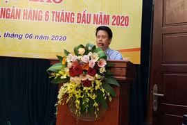 Ông Phạm Tiến Dũng, Vụ trưởng Vụ Thanh toán Ngân hàng Nhà nước trao đổi tại họp báo. (Ảnh: PV/Vietnam+)