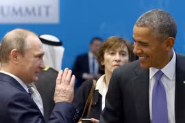 Tổng thống ​Nga Vladimir Putin và người đồng cấp Mỹ Barack Obama. (Nguồn: AFP/TTXVN)