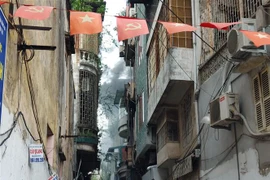 Hiện trường vụ cháy tại Thổ Quan, Hà Nội. (Ảnh: TTXVN phát)