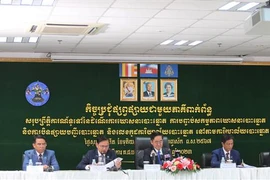 Các quan chức NEC tham dự cuộc gặp. (Ảnh: Hoàng Minh/TTXVN)