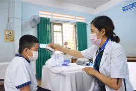 Tổ chức tiêm vaccine phòng COVID-19 cho trẻ em. (Ảnh: Tuấn Anh/TTXVN)